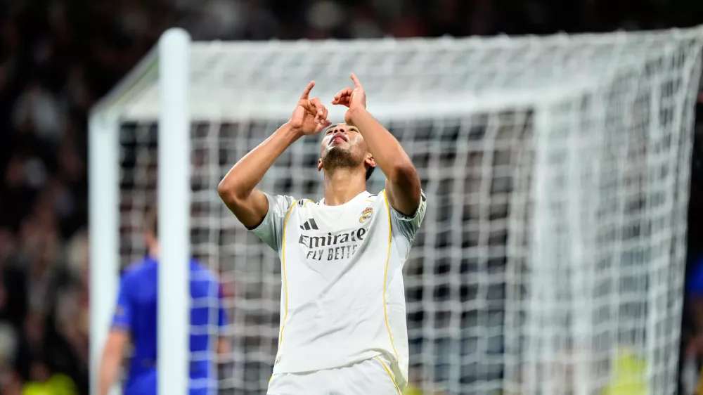 Real Madrid's Jude Bellingham celebrates after scoring his side's sixth goal during the Champions League opening phase soccer match between Real Madrid and Monaco in Madrid on Tuesday, Jan. 20, 2026. (AP Photo/Jose Breton)