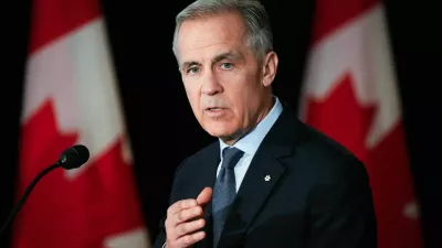 Canada's Prime Minister Mark Carney speaks during a news conference before a cabinet planning forum at the Citadelle in Quebec City, Quebec, Canada January 22, 2026. REUTERS/Mathieu Belanger