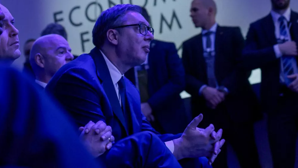 Serbia's President Aleksandar Vucic listens to U.S. President Donald Trump's remarks during the 56th annual World Economic Forum (WEF), in Davos, Switzerland, January 21, 2026. REUTERS/Jonathan Ernst