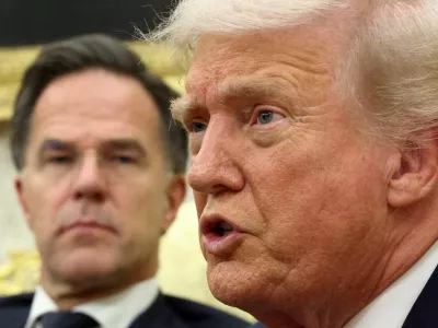 FILE PHOTO: U.S. President Donald Trump speaks as he meets with NATO Secretary General Mark Rutte in the Oval Office of the White House in Washington, D.C., U.S., October 22, 2025. REUTERS/Kevin Lamarque/File Photo