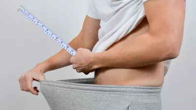 Well equipped. Man measure hes penis with a measuring tape.