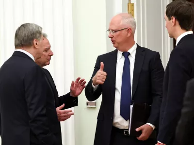 U.S. President Donald Trump's special envoy Steve Witkoff, son-in-law Jared Kushner, Russia's presidential envoy Kirill Dmitriev and foreign policy presidential aide Yuri Ushakov speak before a meeting of President Vladimir Putin with U.S. envoys at the Kremlin in Moscow, Russia, January 22, 2026. Sputnik/Alexander Kazakov/Pool via REUTERS ATTENTION EDITORS - THIS IMAGE WAS PROVIDED BY A THIRD PARTY.