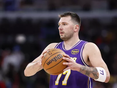 Jan 26, 2026; Chicago, Illinois, USA; Los Angeles Lakers guard Luka Doncic (77) looks to pass the ball against the Chicago Bulls during the second half at United Center. Mandatory Credit: Kamil Krzaczynski-Imagn Images
