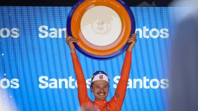 Jay Vine of UAE Team Emirates celebrates victory after stage five of the Tour Down Under road cycle race in Adelaide, Australia, Sunday, Jan. 25, 2026. (Matt Turner/AAP Image via AP)