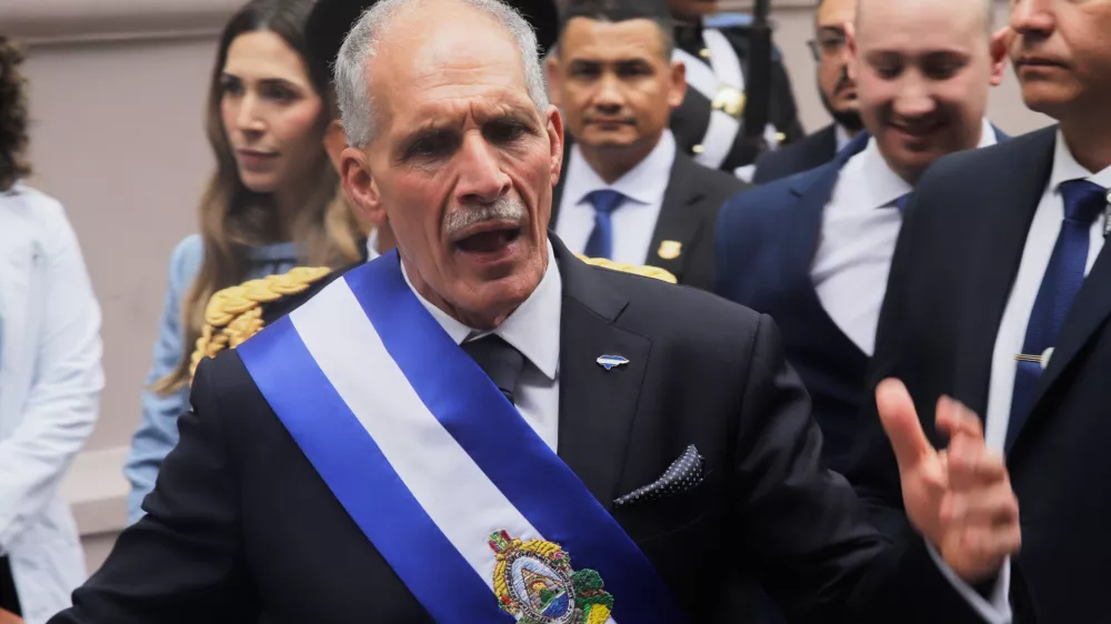 Honduran President Nasry Asfura speaks wearing the presidential sash after his inauguration ceremony at Congress in Tegucigalpa, Honduras, Tuesday, Jan. 27, 2026. (AP Photo/Fernando Destephen)