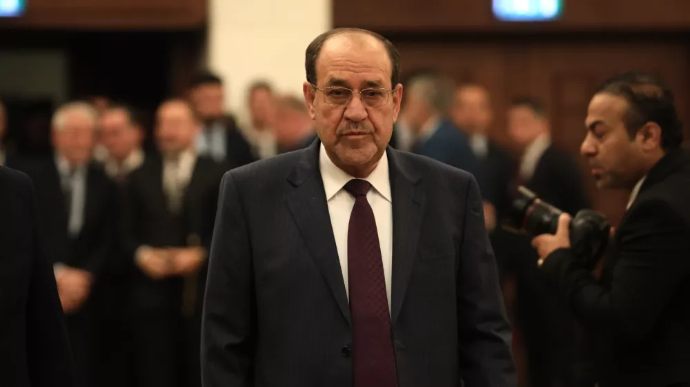 FILED - 18 December 2023, Iraq, Baghdad: Former Iraqi Prime Minister Nouri al-Maliki arrives at a polling station to cast his vote in the first provincial council elections in a decade. Photo: Ameer Al-Mohammedawi/dpa