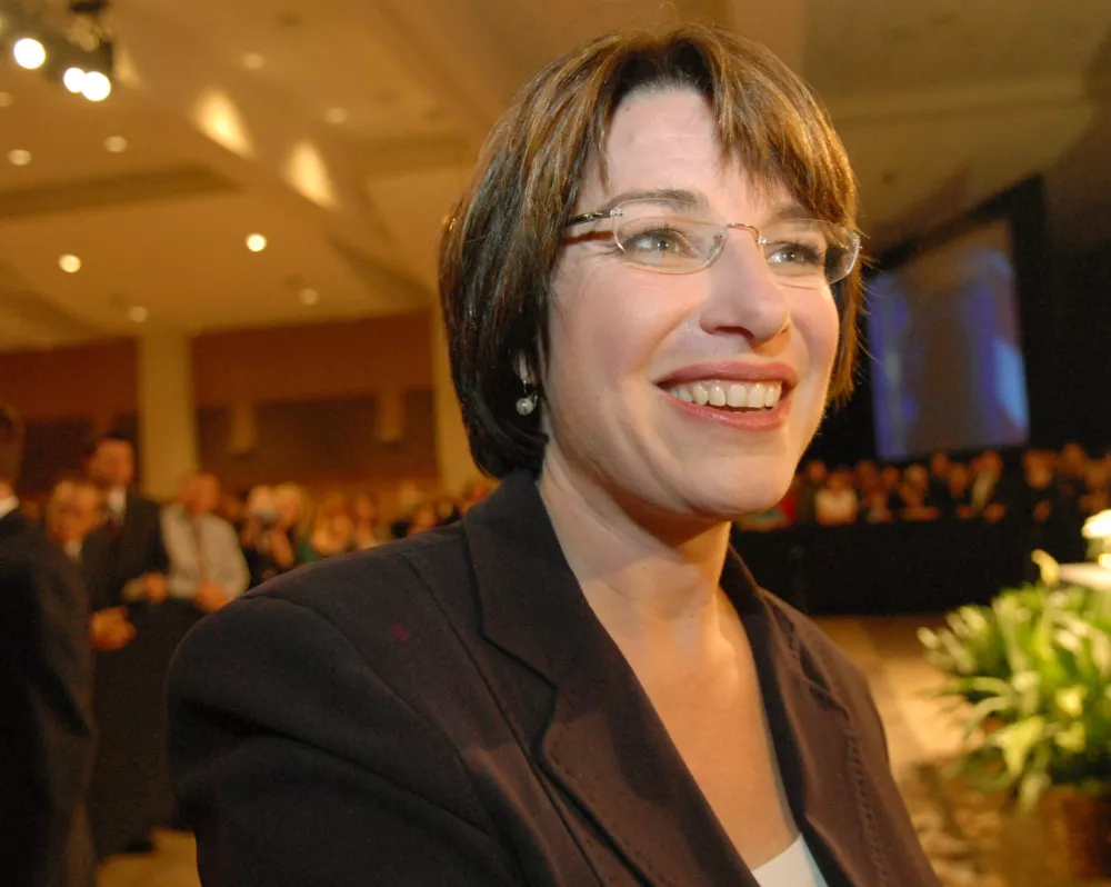 ** FILE **In a file photo Amy Klobuchar, candidate for Minnesota's U.S. Senate seat, greets supporters at a dinner at the RiverCentre in St. Paul, Minn., Saturday, Sept. 16, 2006. Sen. Klobuchar endorsed Sen. Barrack Obama Sunday March 30, 2008. (AP Photo/Janet Hostetter, FILE)