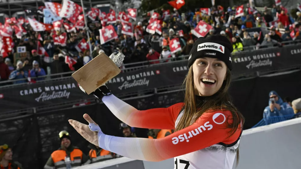 Alpine Skiing - FIS Alpine Ski World Cup - Women's Super G - Crans-Montana, Switzerland - January 31, 2026 Switzerland's Malorie Blanc celebrates after winning the Women's Super G REUTERS/Romina Amato