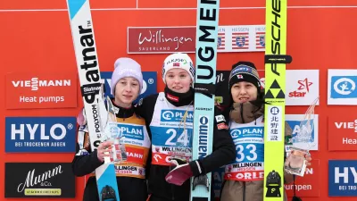 Ski Jumping - FIS Ski Jumping World Cup - Willingen, Germany - January 31, 2026 Norway's Eirin Maria Kvandal celebrates after winning the women's individual HS147 with second placed Slovenia's Nika Prevc and third placed Japan's Nozomi Maruyama REUTERS/Leon Kuegeler