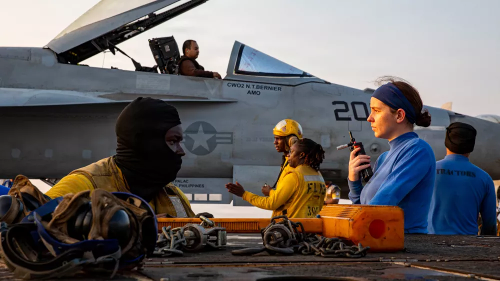 This handout photograph from the U.S. Navy shows sailors taxiing an F/A-18E Super Hornet on the flight deck of the Nimitz-class aircraft carrier USS Abraham Lincoln in the Indian Ocean on Jan. 25, 2026. (Mass Communication Specialist 3rd Class Shepard Fosdyke-Jackson/U.S. Navy via AP)