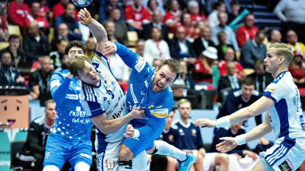 Croatia's Luca Cindric, center, throws the ball during the Euro 2026 third place match between Iceland and Croatia in Herning, Denmark, Sunday, Feb. 1, 2026. (Henning Bagger/Ritzau Scanpix via AP)