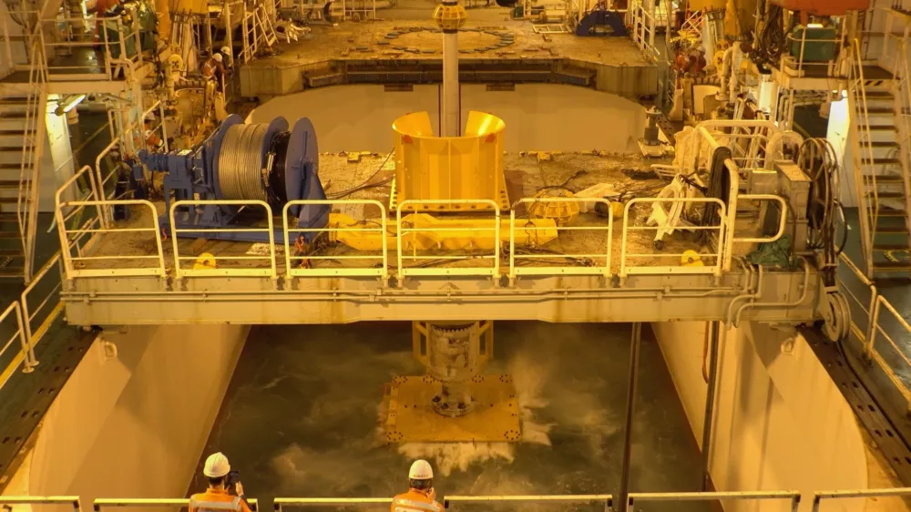 This photo provided by SIP/Japan Agency for Marine-Earth Science and Technology, shows a mining device lowered to the seabed from the deep-sea drilling vessel Chikyu, off Minamitorishima, south of Tokyo, Jan. 18, 2026. (SIP/Japan Agency for Marine-Earth Science and Technology via AP)