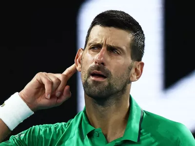 Tennis - Australian Open - Melbourne Park, Melbourne, Australia - January 24, 2026 Serbia's Novak Djokovic celebrates and gestures to crowd after winning his third round match against Netherlands' Botic van de Zandschulp REUTERS/Tingshu Wang  TPX IMAGES OF THE DAY