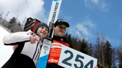 FILE PHOTO: Ski Jumping - FIS Ski Jumping World Cup - Planica, Slovenia - March 30, 2025 Slovenia's Domen Prevc poses with his sister Nika Prevc after setting a new world record in the Men's Individual HS240 Second Round REUTERS/Borut Zivulovic/File Photo