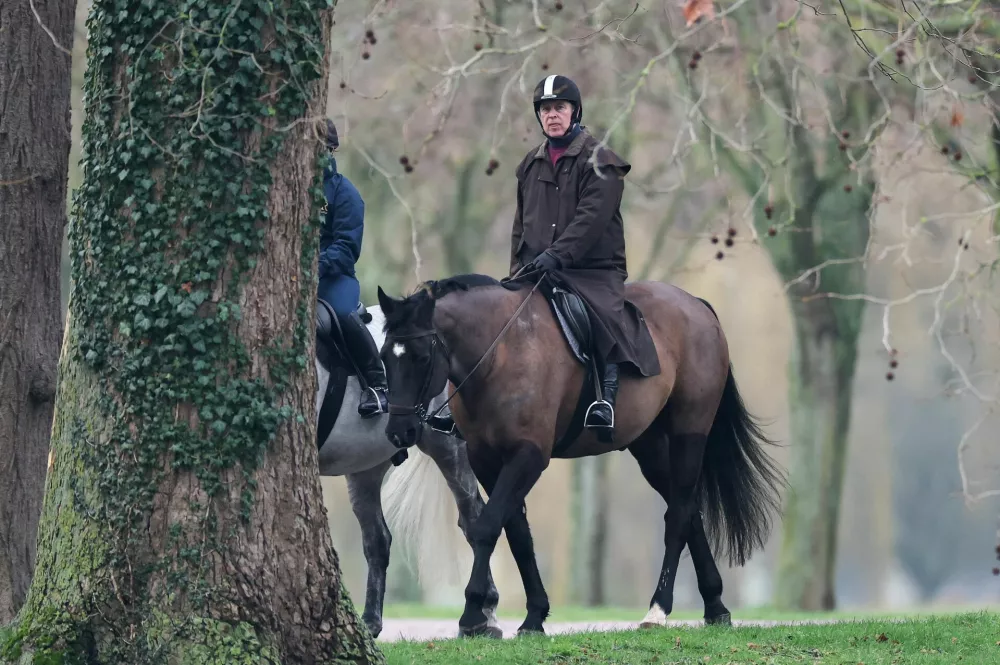 Andrew Mountbatten-Windsor rides a horse in Windsor Great Park, near to Royal Lodge, a property on the estate surrounding Windsor Castle, where Andrew Mountbatten-Windsor, the younger brother of Britain's King Charles, resides, after the U.S. Justice Department has released more records tied to the late financier and convicted sex offender Jeffrey Epstein, in Windsor, Britain, February 2, 2026. REUTERS/Toby Melville