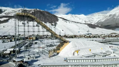 FILE PHOTO: A drone view shows the big ski jump in the snow park in Livigno, which will host all Snowboard and Freestyle Skiing events, including disciplines like Halfpipe, Slopestyle, Big Air, Ski Cross, Snowboard Cross, Moguls, Aerials, and Parallel Giant Slalom as part of the Milano Cortina Winter Olympic games in Italy, January 9, 2026. REUTERS/Yara Nardi/File Photo
