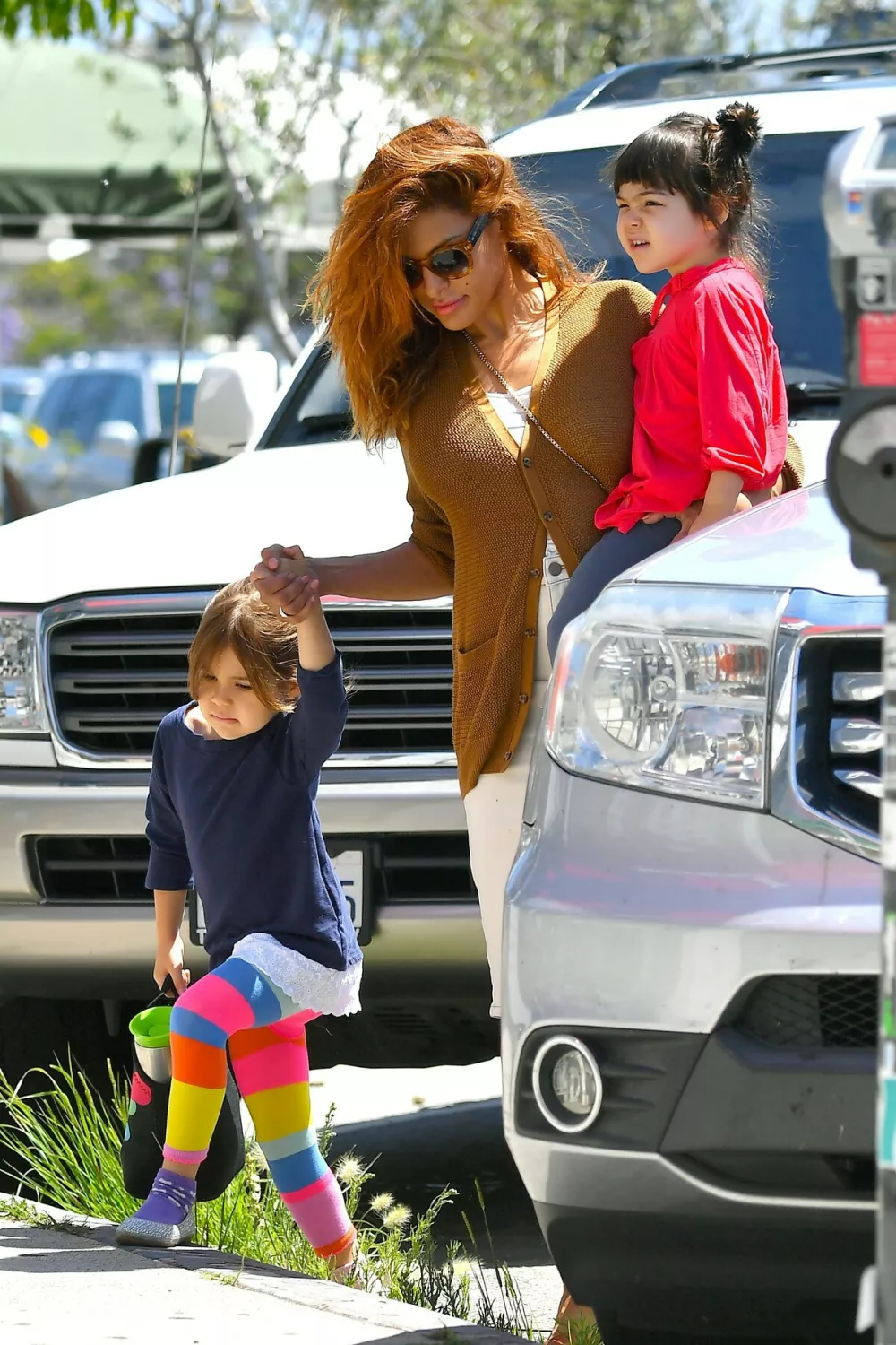 EXCLUSIVE: Eva Mendes has her hands full as she heads out to lunch with her two daughters. The actress and Ryan Gosling's girlfriend was seen heading to lunch with her daughters Amada and Esmeralda. The actress was seen heading to a restaurant in the Silverlake area of Los Angeles.29 May 2019,Image: 439762036, License: Rights-managed, Restrictions: World Rights, Model Release: no, Pictured: Eva Mendes, Amada Gosling, Esmeralda Gosling