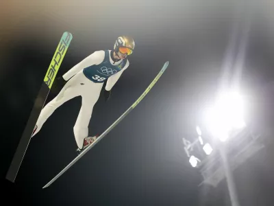 Milano Cortina 2026 Olympics - Ski Jumping - Men's Normal Hill Training - Predazzo Ski Jumping Stadium, Predazzo, Italy - February 5, 2026 Kacper Tomasiak of Poland in action during training REUTERS/Kacper Pempel