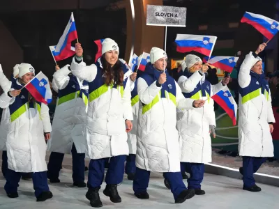 Team Slovenia arrives for the Olympic opening ceremony at the 2026 Winter Olympics, in Cortina d'Ampezzo, Italy, Friday, Feb. 6, 2026. (AP Photo/Misper Apawu)