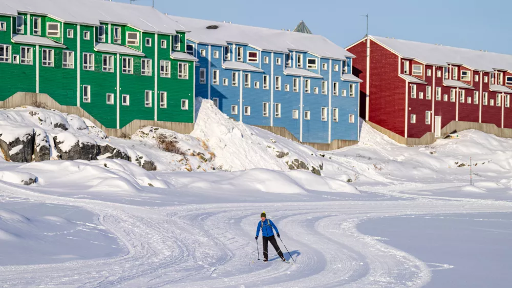 A person skis in Nuuk, Greenland, Friday, Feb. 6, 2026. (Christinne Muschi /The Canadian Press via AP)