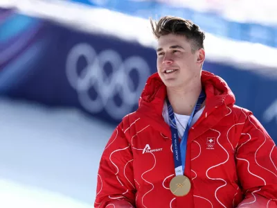 Milano Cortina 2026 Olympics - Alpine Skiing - Men's Downhill Victory Ceremony - Stelvio Ski Centre, Bormio, Italy - February 07, 2026. Gold medallist Franjo von Allmen of Switzerland celebrates on the podium after winning the Men's Downhill REUTERS/Gintare Karpaviciute