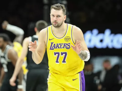 Feb 3, 2026; Brooklyn, New York, USA; Los Angeles Lakers guard Luka Doncic (77) gestures after scoring in the third quarter against the Brooklyn Nets at Barclays Center. Mandatory Credit: Wendell Cruz-Imagn Images