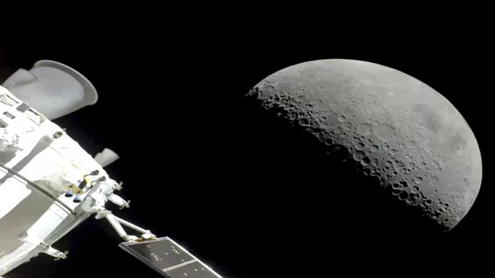 NASA's Orion spacecraft flew past the moon on Monday, December 5, 2022. The crew capsule and its test dummies will aim for a Pacific Ocean splashdown on Sunday, December 11, 2022, off the coast of San Diego after a three-week test flight, setting the stage for astronauts on the next flight in a couple years. (NASA via AP)