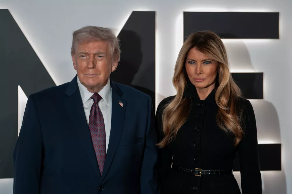 29 January 2026, US, Washington: US President Donald Trump and Lady Melania Trump arrive at the premiere of the Amazon MGM Studios film "Melania" at the John F. Kennedy Center for the Performing Arts in Washington DC. The film documents the period leading up to the 2025 Presidential Inauguration and Melania Trump's role during the White House transition. Photo: Andrew Leyden/ZUMA Press Wire/dpa