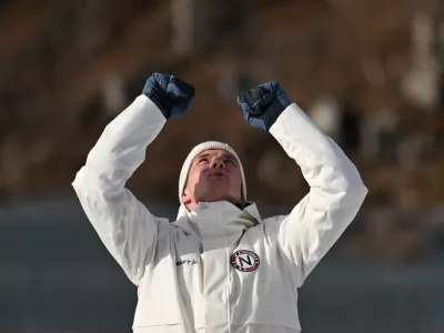 10 February 2026, Italy, Antholz: Gold medallist Norway's Johan-Olav Botn reacts on the podium after the Men's Biathlon 20km individual event during the Milano Cortina 2026 Winter Olympic Games at the Anterselva Biathlon Arena in Antholz. Photo: Hendrik Schmidt/dpa