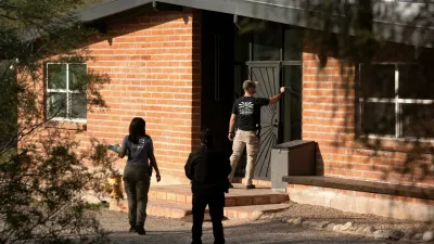Investigators canvass Annie Guthrie's neighborhood after the disappearance of Nancy Guthrie, the 84-year-old mother of U.S. journalist and television host Savannah Guthrie, who went missing from her home in Tucson, U.S. February 10, 2026. REUTERS/Rebecca Noble