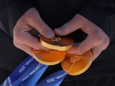 Milano Cortina 2026 Winter Olympics - Alpine Skiing - Photocall with Franjo von Allmen - Stelvio Ski Centre, Bormio, Italy - February 12, 2026 Franjo von Allmen of Switzerland holds his gold medals for photograph REUTERS/Denis Balibouse