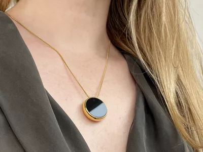 WORDS BYLINE: Hayley ChamberlainA new wearable necklace has been developed to help people monitor and protect their skin from everyday exposure to light.US startup Loox has revealed the Loox Pendant, which it claims is the world's first AI-powered device capable of tracking UV and visible light in real time.The pendant-style device has been created in response to mounting scientific evidence showing that more than 80% of visible skin ageing is caused by sun exposure. Developers say the goal is to bridge the gap between research and real-life behaviour, giving users personalised insights they can act on day to day.Worn around the neck and positioned close to the face &ndash; the most exposed part of the body &ndash; the Loox Pendant continuously measures UV and light levels throughout the day. Its three core functions include daily exposure tracking, live UV and light readings, and detection of so-called "hidden UV" sources.These hidden sources can include light entering through windows or even indoor lighting, exposure many people don't realise they're getting. The device can also alert users if they're not getting enough sunlight, which plays a key role in overall skin health.Data collected by the pendant is processed using AI and combined with more than 24 personal and environmental factors, including skin type, tone and sensitivity, UV index and cloud coverage. From this, the device delivers six tailored insights: Morning Sunlight, UV Protection, Hidden UV Protection, UV Balance, UV Recovery and Evening Light.According to the company, this allows the pendant to adapt to each user's lifestyle and surroundings, helping them decide when it's time to apply SPF &ndash; and when it may not be necessary.The hardware itself features ultra-sensitive, wide-angle UV and visible light sensors capable of detecting even very low levels of exposure. Despite its technical focus, Loox has leaned heavily into aesthetics, designing the pendant as a fashion-forward accessory made from premium materials.The wearable is water and dust resistant, comes with an adjustable neck strap and supports wireless charging. A single charge is said to last up to seven days.Loox says its broader mission is to "redefine the relationship with light" and help users harness its effects for better long-term health and longevity.The Loox Pendant will be available in SkySilver, JetBlack and SunGold finishes, with 15 different neck strap colour combinations. Pre-orders are set to open in early 2026, with deliveries expected by mid-2026.Prices will start from 9 (&pound;140) for limited Insider editions, which can be reserved now for  via the company's website.When: 16 Jan 2026Credit: Loox/INSTARimages**EDITORIAL USE ONLY. MATERIALS ONLY TO BE USED IN CONJUNCTION WITH EDITORIAL STORY. THE USE OF THESE MATERIALS FOR ADVERTISING, MARKETING OR ANY OTHER COMMERCIAL PURPOSE IS STRICTLY PROHIBITED. MATERIAL COPYRIGHT REMAINS WITH STATED PHOTOGRAPHER AND/OR SUPPLIER.**,Image: 1066513092, License: Rights-managed, Restrictions: EDITORIAL USE ONLY. MATERIALS ONLY TO BE USED IN CONJUNCTION WITH EDITORIAL STORY. THE USE OF THESE MATERIALS FOR ADVERTISING, MARKETING OR ANY OTHER COMMERCIAL PURPOSE IS STRICTLY PROHIBITED. MATERIAL COPYRIGHT REMAINS WITH STATED PHOTOGRAPHER AND/OR SUPP, Model Release: no