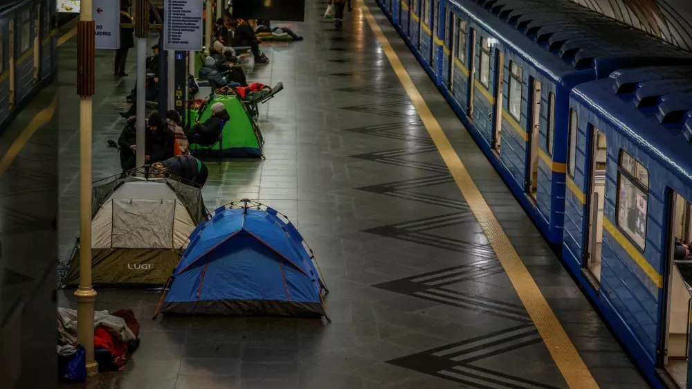 Residents take shelter inside a metro station during an air raid alert, amid Russia's attack on Ukraine, as overnight Russian drone and missile strike continues across the country, in Kyiv, Ukraine, February 17, 2026. REUTERS/Alina Smutko