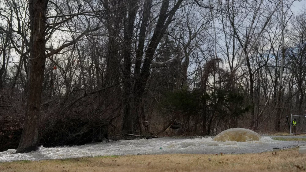 Untreated sewage spills out of the collapsed Potomac Interceptor sewer line next to the Clara Barton Parkway in Bethesda, Maryland, U.S., January 23, 2026. REUTERS/Leah Millis