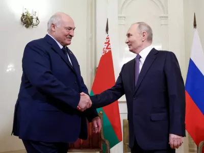 FILE PHOTO: Russian President Vladimir Putin and Belarusian President Alexander Lukashenko attend a meeting on the sidelines of the summit of the Supreme Eurasian Economic Council in Saint Petersburg, Russia, December 21, 2025. Sputnik/Alexander Kazakov/Pool via REUTERS ATTENTION EDITORS - THIS IMAGE WAS PROVIDED BY A THIRD PARTY./File Photo