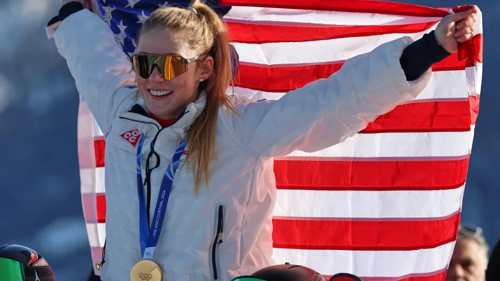 United States' Mikaela Shiffrin celebrates winning the gold medal of the alpine ski, women's slalom race, at the 2026 Winter Olympics, in Cortina d'Ampezzo, Italy, Wednesday, Feb. 18, 2026. (AP Photo/Marco Trovati)