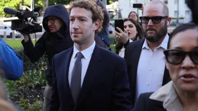 Meta CEO Mark Zuckerberg arrives for a landmark trial over whether social media platforms deliberately addict and harm children, Wednesday, Feb. 18, 2026, in Los Angeles. (AP Photo/Ryan Sun)