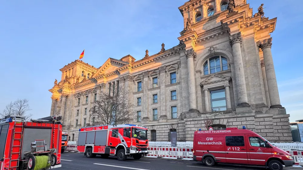 Fire trucks are parked in front of the Reichstag in Berlin, Germany, February 19, 2026. REUTERS/Tobias Schlie