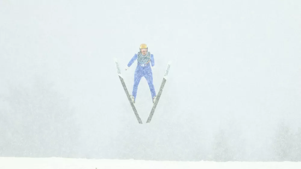 Milano Cortina 2026 Olympics - Nordic Combined - Team Sprint, Ski Jumping Trial Round - Predazzo Ski Jumping Stadium, Predazzo, Italy - February 19, 2026. Vid Vrhovnik of Slovenia in action during the ski jumping trial round REUTERS/Kai Pfaffenbach