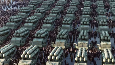 This photo provided by the North Korean government shows new launch vehicles for nuclear-capable short-range missiles during a military ceremony in Pyongyang, North Korea, Wednesday, Feb. 18, 2026. Independent journalists were not given access to cover the event depicted in this image distributed by the North Korean government. The content of this image is as provided and cannot be independently verified. Korean language watermark on image as provided by source reads: "KCNA" which is the abbreviation for Korean Central News Agency. (Korean Central News Agency/Korea News Service via AP)