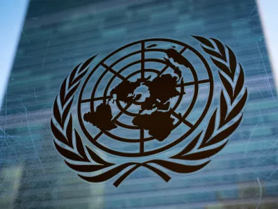 FILE - The symbol of the United Nations is displayed outside the Secretariat Building, Feb. 28, 2022, at United Nations Headquarters. (AP Photo/John Minchillo, File)