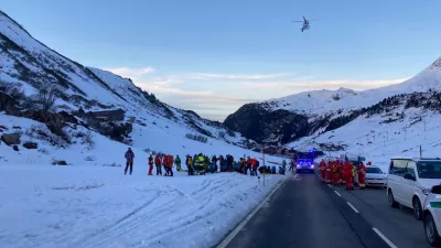 Rescue workers stand near the site where an avalanche buried 10 skiers in the Lech/Zuers free skiing area on Arlberg, Austria, December 25, 2022. Police Vorarlberg/Handout via REUTERS  THIS IMAGE HAS BEEN SUPPLIED BY A THIRD PARTY. NO RESALES. NO ARCHIVES.