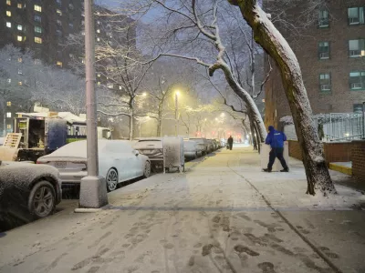 A man works in a snowstorm, Sunday, Feb. 22, 2026, in New York. (AP Photo/Pamela Hassell)