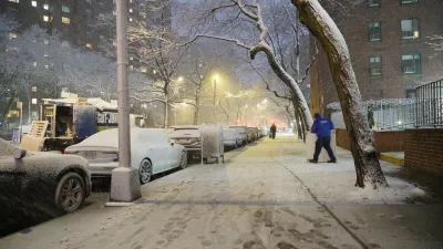 A man works in a snowstorm, Sunday, Feb. 22, 2026, in New York. (AP Photo/Pamela Hassell)