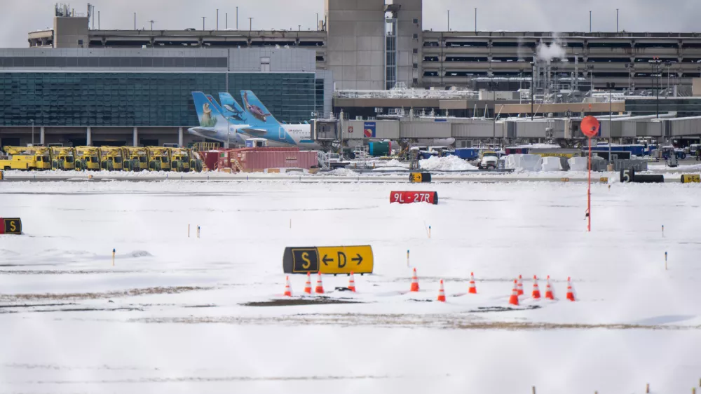 The Philadelphia International Airport following Sunday's snowfall on Monday, Feb. 23, 2026, in Philadelphia. (AP Photo/Joe Lamberti)