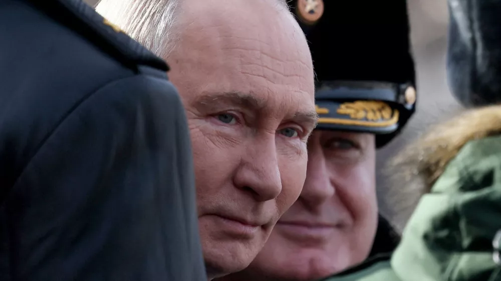 Russia's President Vladimir Putin takes part in a wreath laying ceremony marking Defender of the Fatherland Day at the Tomb of the Unknown Soldier by the Kremlin Wall in Moscow, Russia, February 23, 2026. Maxim Shipenkov/Pool via REUTERS