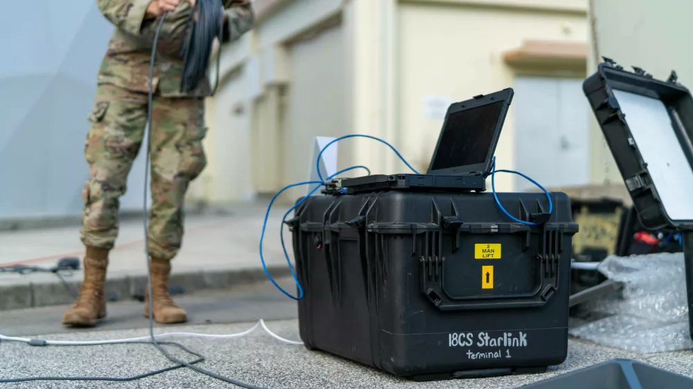 RECORD DATE NOT STATED Airman 1st Class Calvin Ledford, 18th Communications Squadron expeditionary communications technician, connects a laptop to a Starlink terminal for a performance test at Kadena Air Base, Japan, Jan. 10, 2023. Starlink takes about 10 minutes to set up, which is a vast improvement over our last antenna that took over 45 minutes in set up time, said Ledford. Copyright: xpiemagsx dvidspiemilr24022023-5703 ACHTUNG AUFNAHMEDATUM GESCH&Auml;TZTNo Use Switzerland. No Use Germany. No Use Japan. No Use Austria