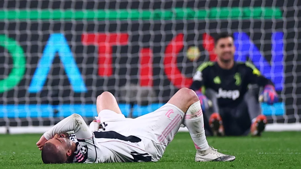Soccer Football - UEFA Champions League - Play Off - Second Leg - Juventus v Galatasaray - Allianz Stadium, Turin, Italy - February 25, 2026 Juventus' Edon Zhegrova looks dejected after the match REUTERS/Guglielmo Mangiapane