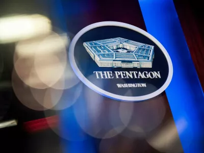 FILE PHOTO: The Pentagon logo is seen behind the podium in the briefing room at the Pentagon in Arlington, Virginia, U.S., January 8, 2020. REUTERS/Al Drago/File Photo