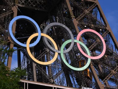 23 July 2024, France, Paris: The Olympic Rings are seen on the Eiffel tower ahead of the 2024 Paris Summer Olympic Games at in Paris. Photo: Dave Hunt/AAP/dpa